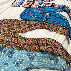 4 pairs of fun-print, OS Lularoe leggings - fits small/medium